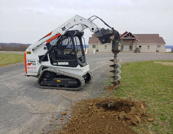 Bobcat T450 Skidsteer rental with auger